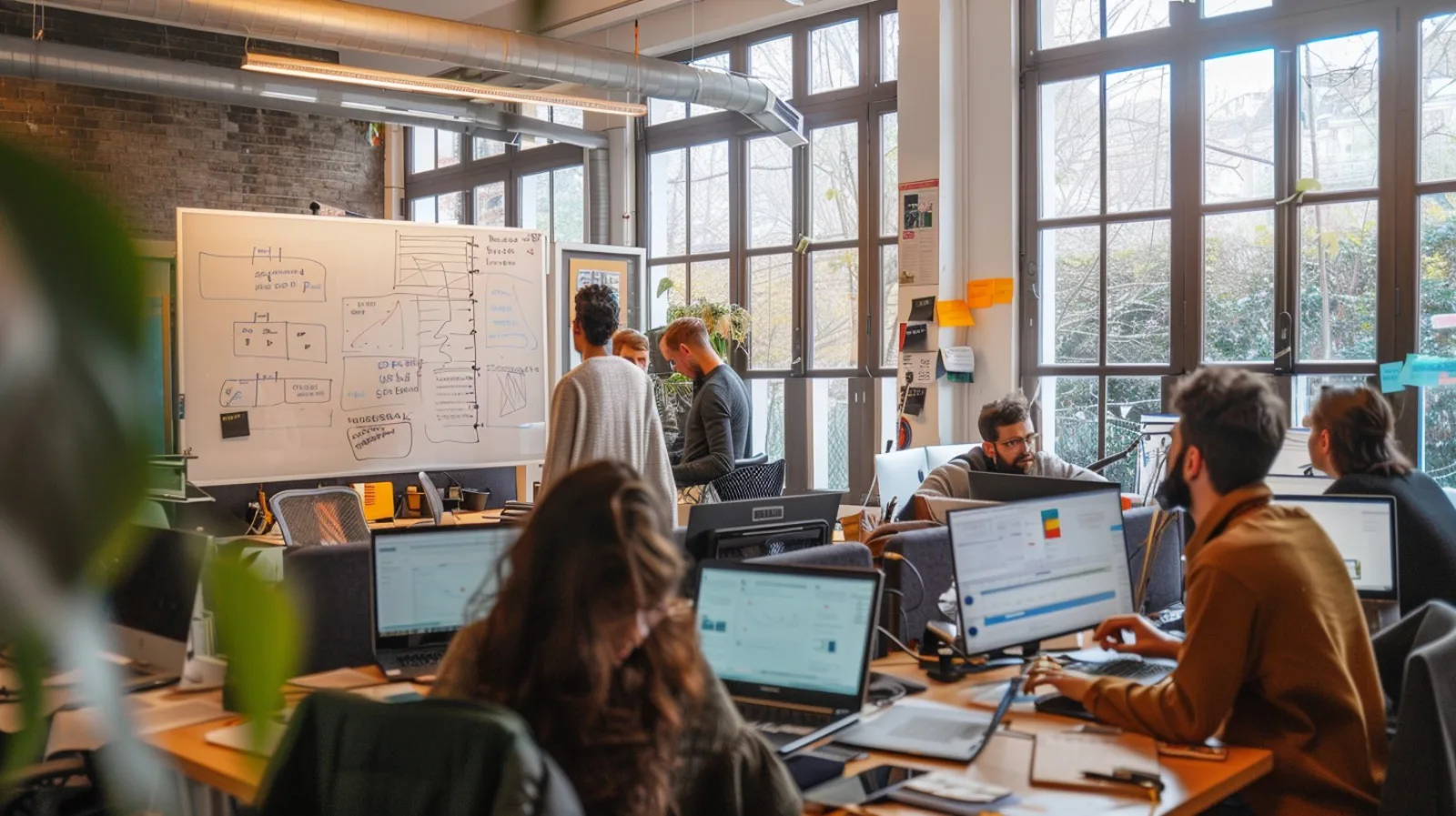 A busy, focused studio workspace in natural light